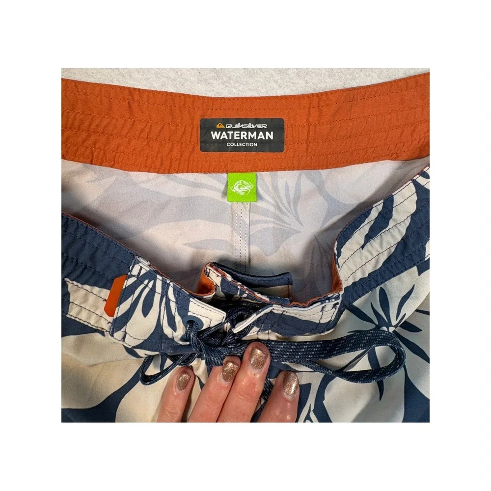 Quiksilver Waterman Collection Mens Navy Floral Board Shorts Bottle Opener 40